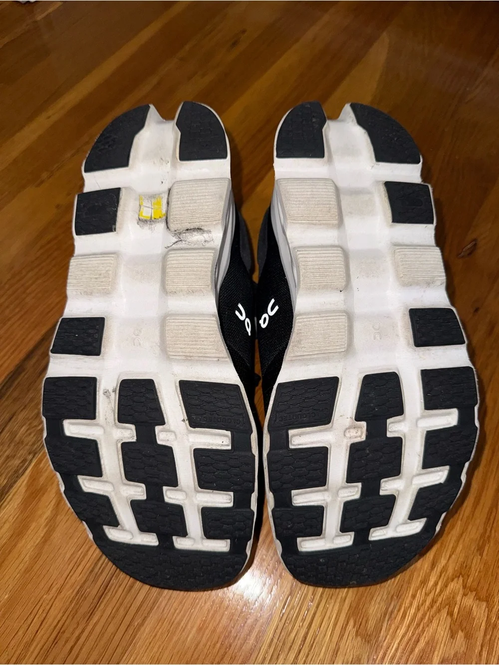 On Cloud Women's Black and White Running Sneakers